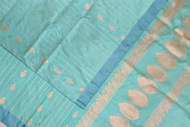 Banarasi katan pure silk saree in teal blue  with stripes & floral motifs in gold.