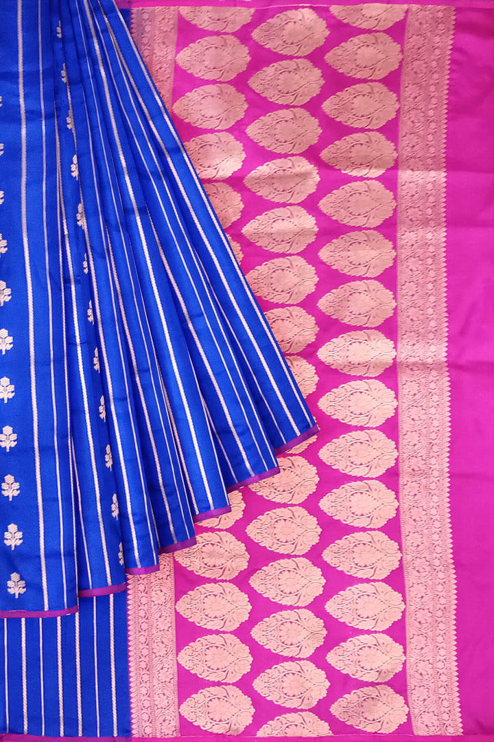 Banarasi katan pure silk saree in royal blue with stripes & floral motifs in gold.