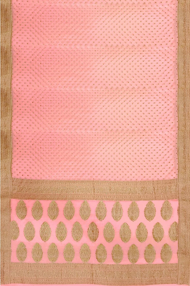 Banarasi silk georgette saree in  peach  with small motifs