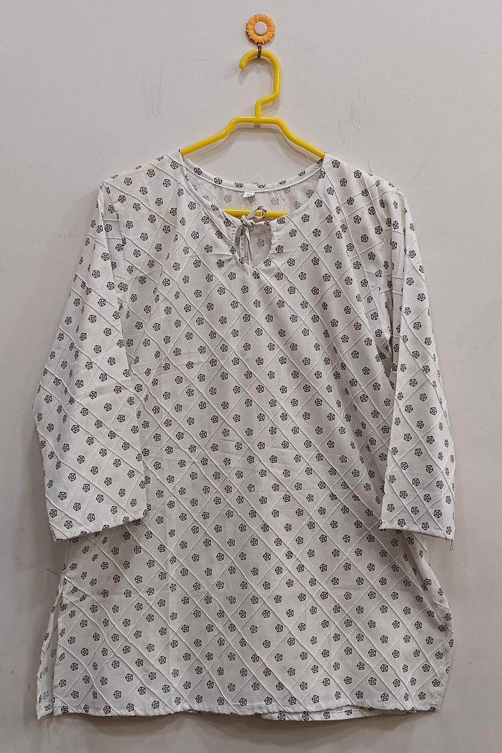 Pin tuck  pure cotton tunic in white with circular motifs