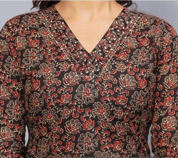 Cotton kurti  in straight cut in black.