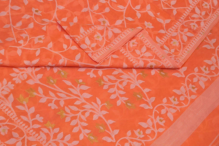 Handloom silk cotton saree in orange in floral jamdani weave