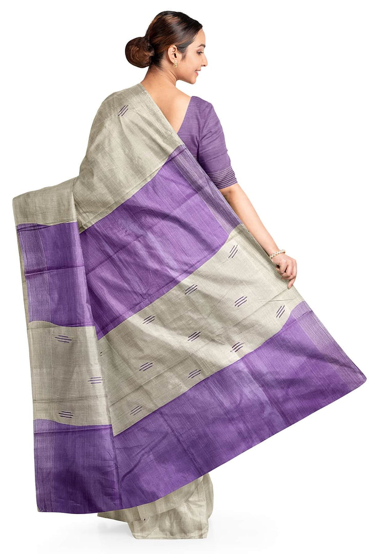 Handwoven Eri  silk saree in beige with striped pallu  and a contrast blouse