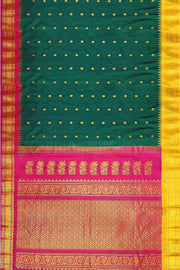Handwoven Gadwal pure silk saree in bottle green  with small motifs