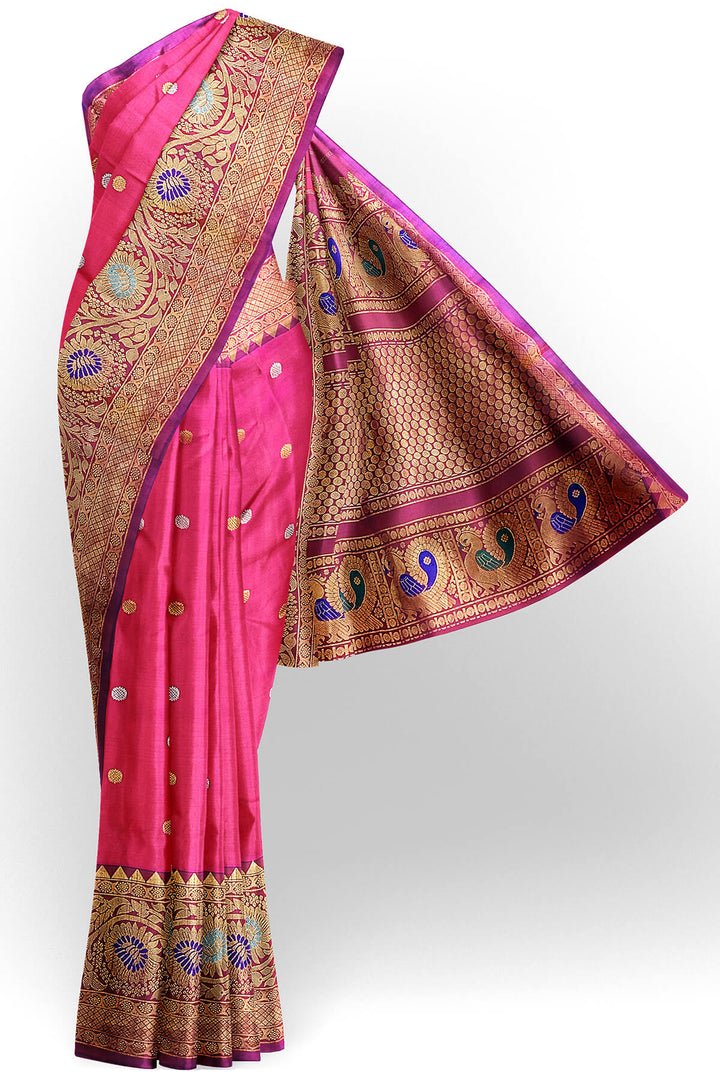Handwoven Gadwal pure silk saree in pink with gold & silver motifs  all over the body.