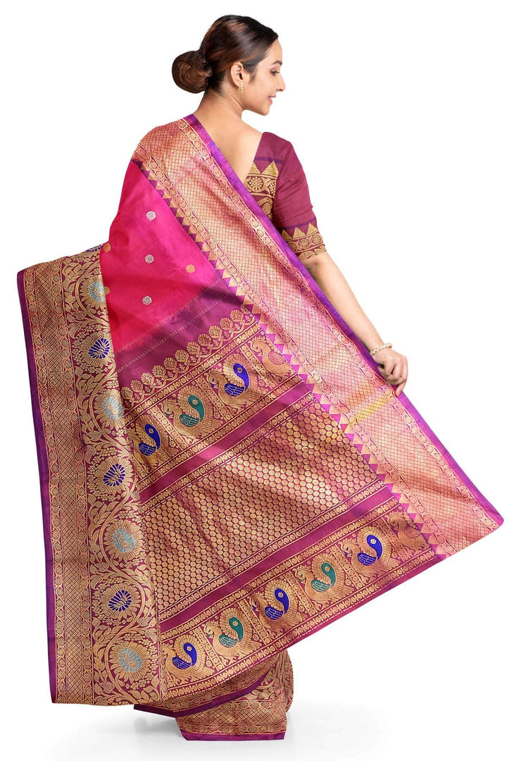 Handwoven Gadwal pure silk saree in pink with gold & silver motifs  all over the body.