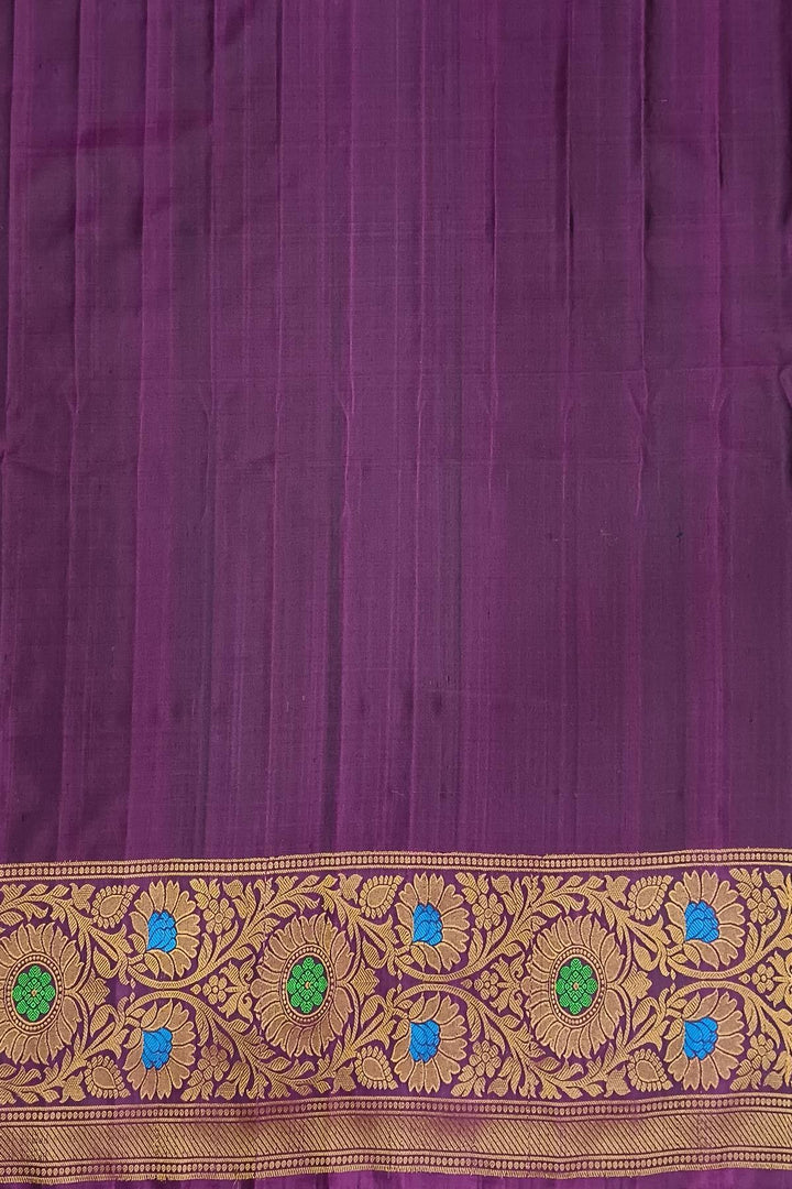 Handwoven Gadwal pure silk brocade saree in blue with rain drop motifs  all over the body.