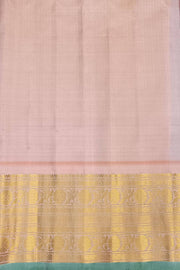 Handwoven Gadwal pure silk saree in purple with floral and paisley  motifs in gold & silver.