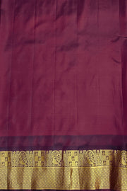 Gadwal pure silk saree in honey with  peacock & disc motif in gold.
