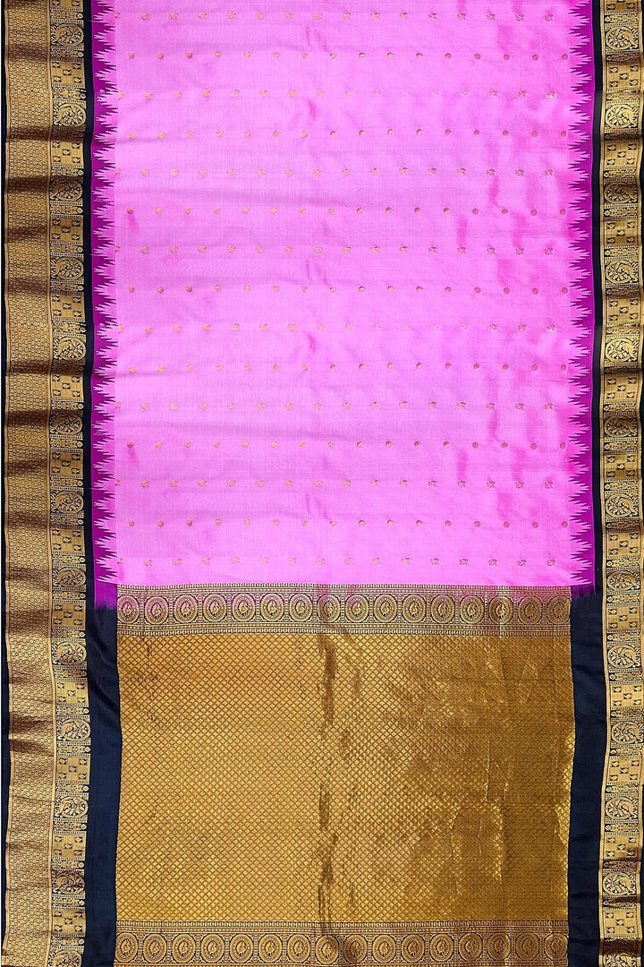 Gadwal pure silk saree in pink with  peacock &  disc  motif in gold.