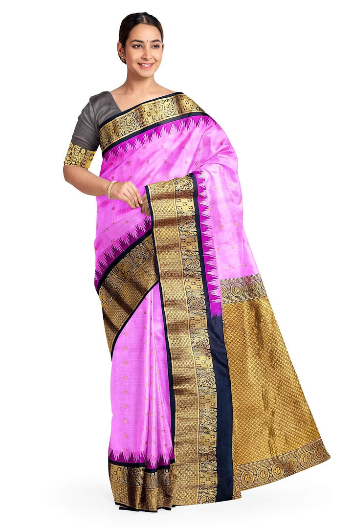 Gadwal pure silk saree in pink with  peacock &  disc  motif in gold.