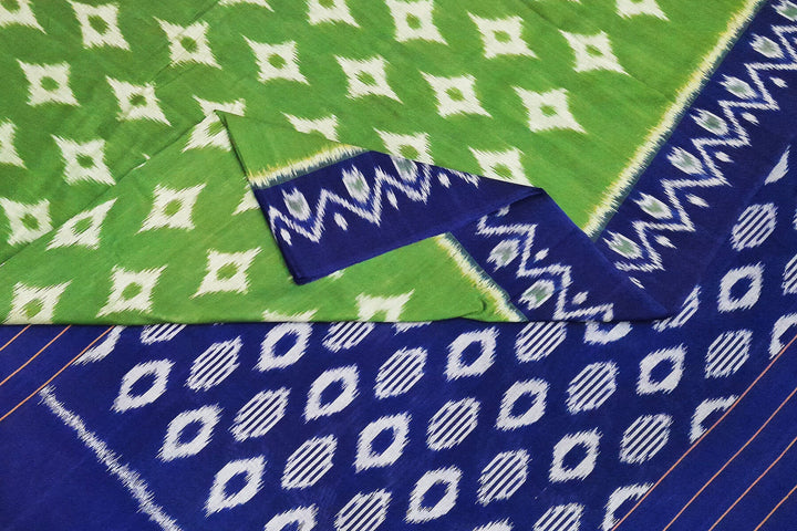 Handwoven ikat pure cotton saree  in dark green