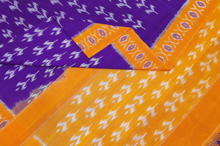 Handwoven ikat pure cotton saree in violet  with floral motifs .