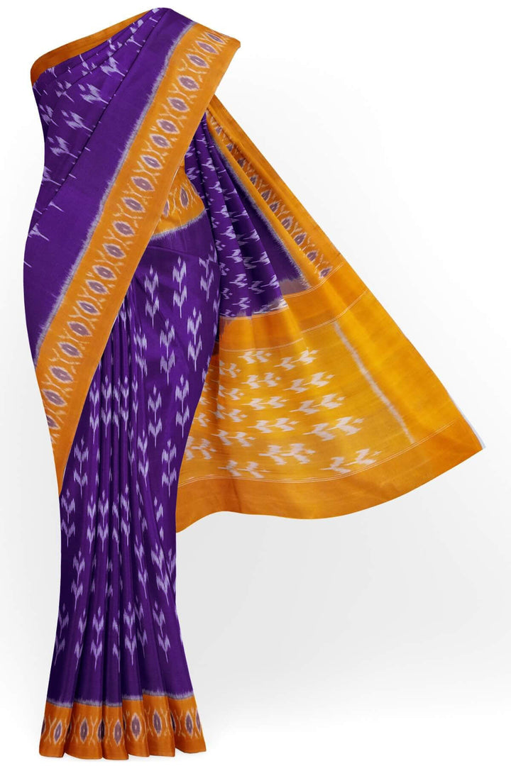 Handwoven ikat pure cotton saree in violet  with floral motifs .
