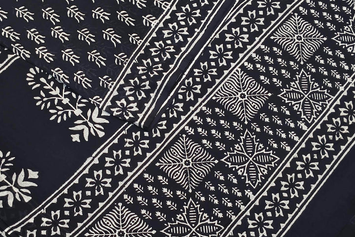 Jaipur mul cotton saree in black in floral pattern.
