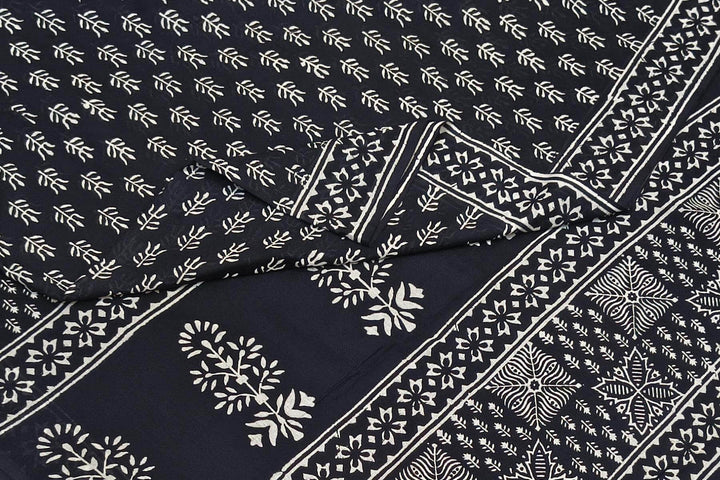 Jaipur mul cotton saree in black in floral pattern.