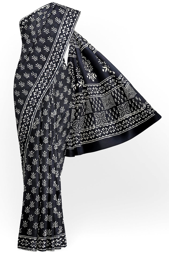 Jaipur mul cotton saree in black in floral pattern.