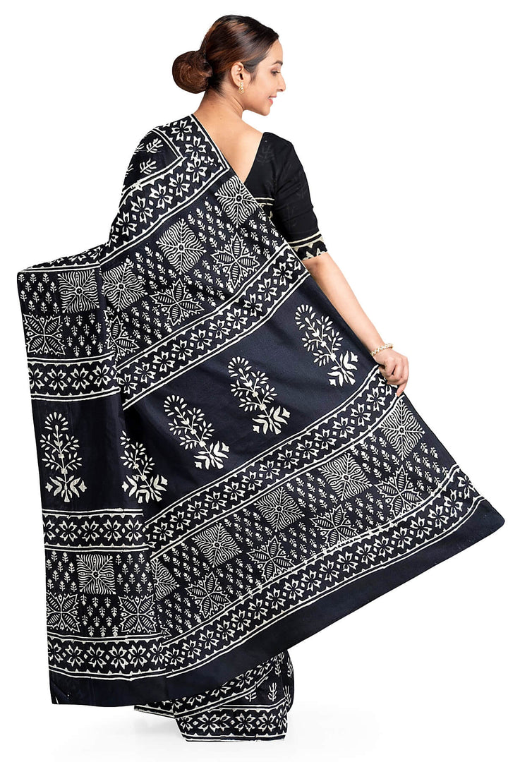 Jaipur mul cotton saree in black in floral pattern.