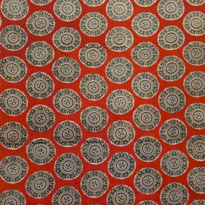 Kalamkari  silk cotton fabric in maroon with  disc motifs