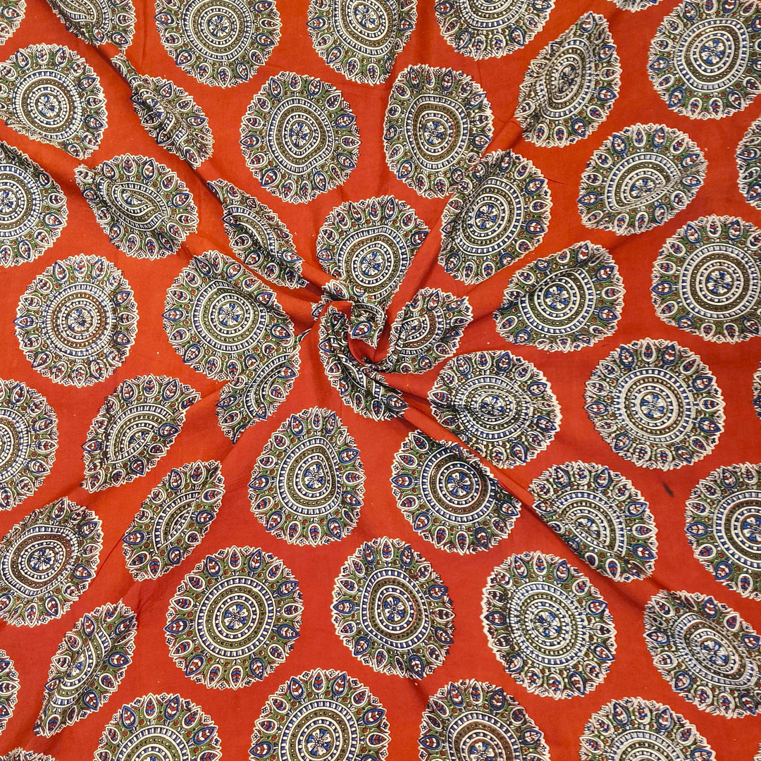 Kalamkari  silk cotton fabric in maroon with  disc motifs