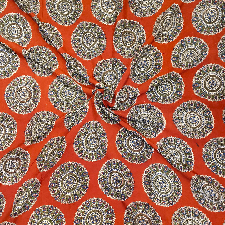 Kalamkari  silk cotton fabric in maroon with  disc motifs