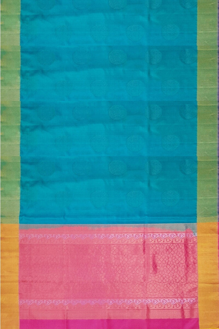 Kanchi soft silk  saree in teal blue with big motifs and geometric pattern in pallu.