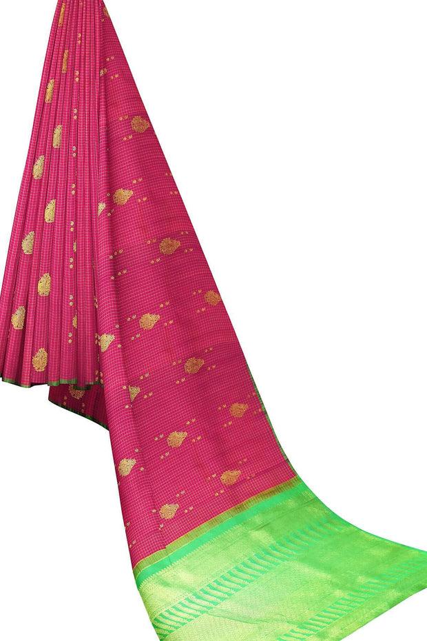 Handwoven Kanchi  pure silk saree in fine zari checks with paisley motifs.