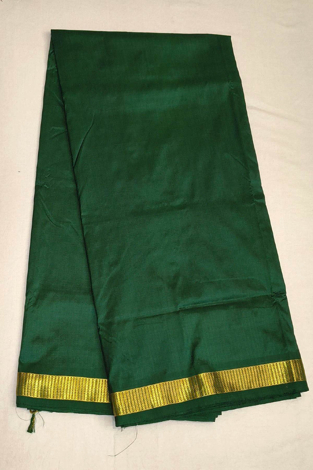 Kanchi  pure silk saree in bottle green ( 9 yards )