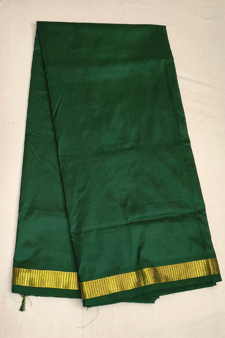 Kanchi  pure silk saree in bottle green ( 9 yards )
