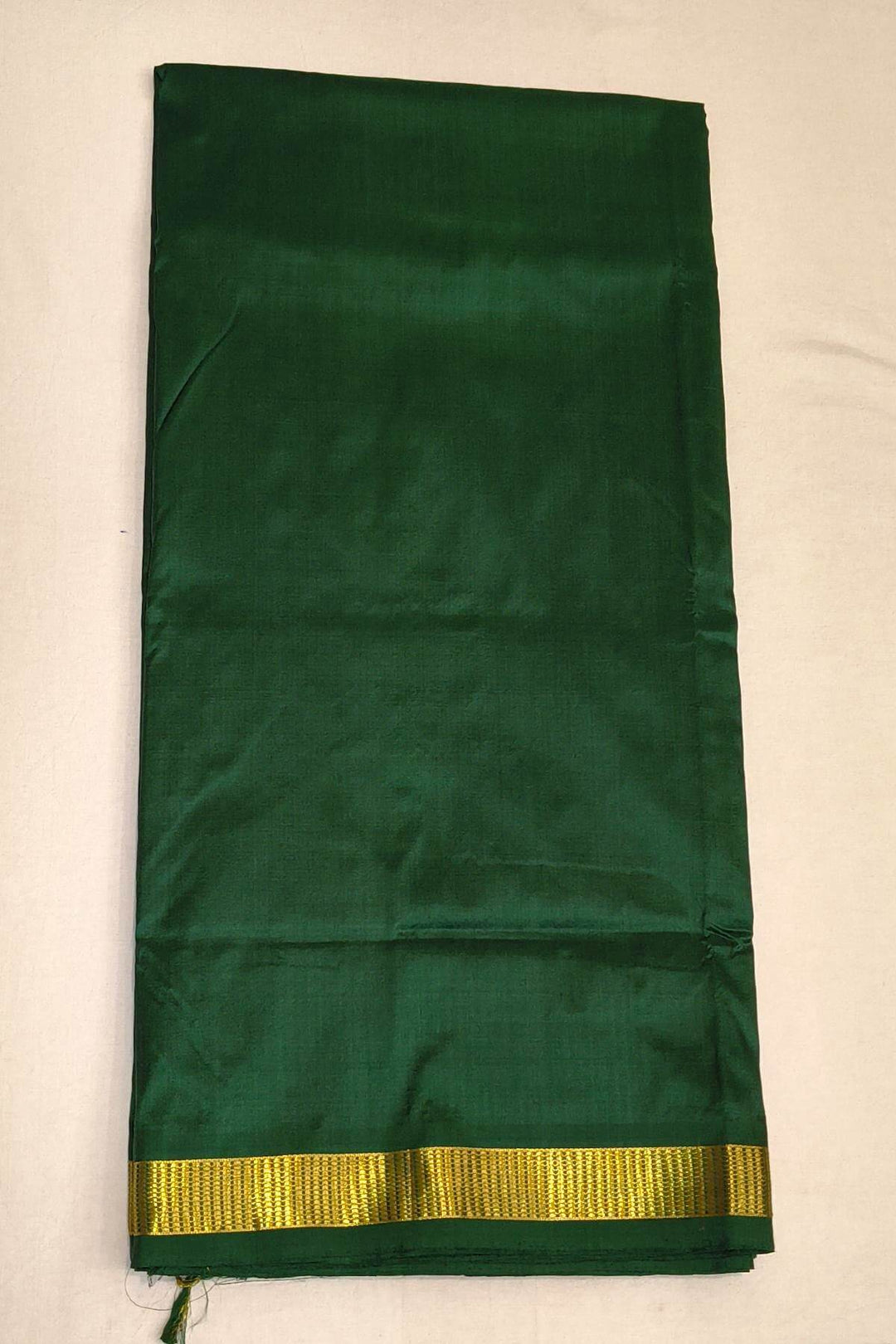 Kanchi  pure silk saree in bottle green ( 9 yards )
