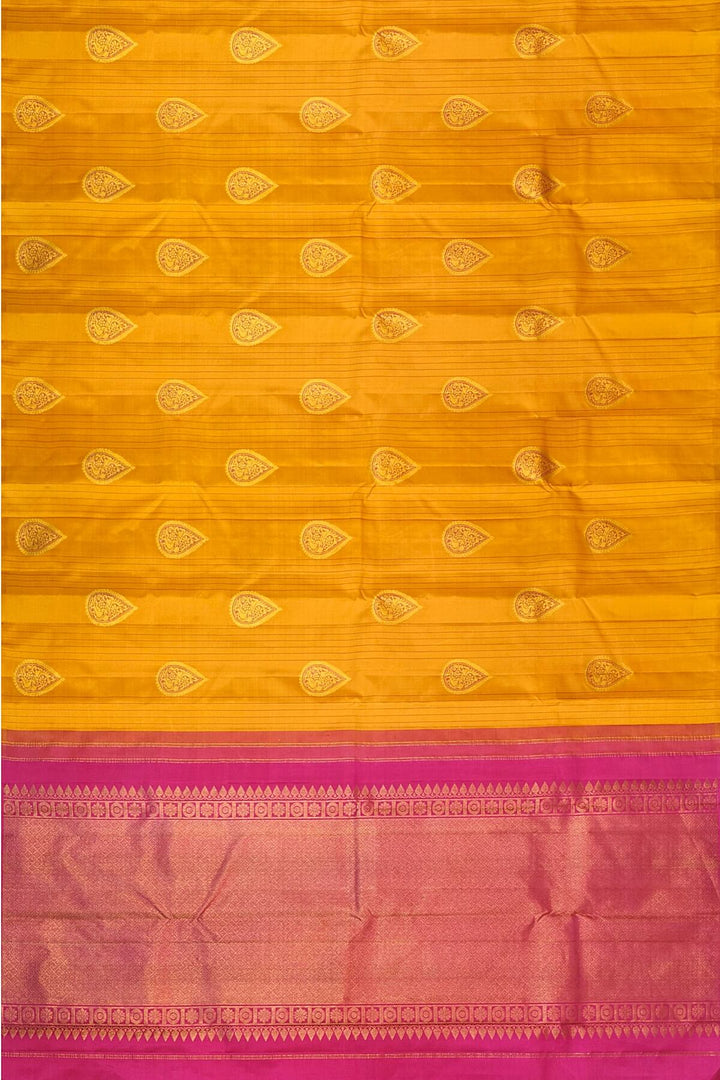 Kanchi borderless pure silk saree in mustard  with paisley motifs