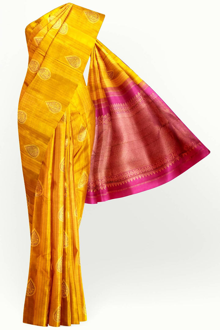 Kanchi borderless pure silk saree in mustard  with paisley motifs