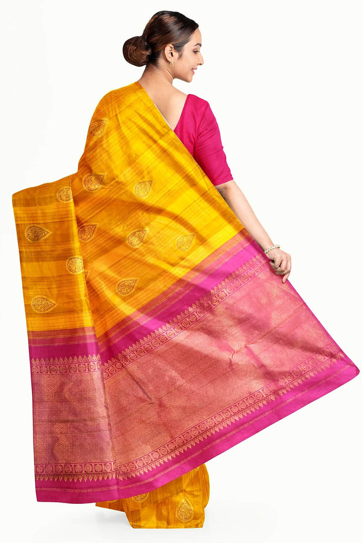 Kanchi borderless pure silk saree in mustard  with paisley motifs