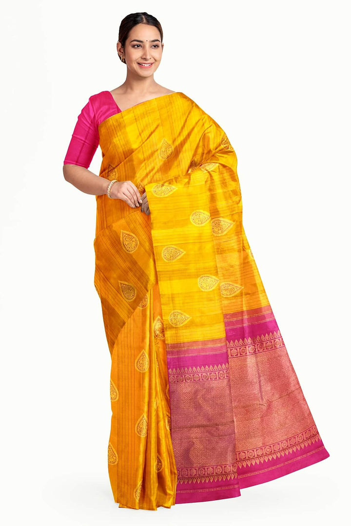 Kanchi borderless pure silk saree in mustard  with paisley motifs