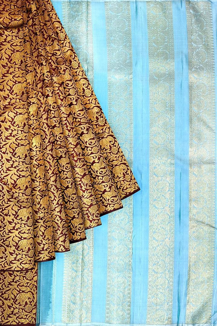 Kanchi  pure silk  brocade saree in brown with floral & animal motifs