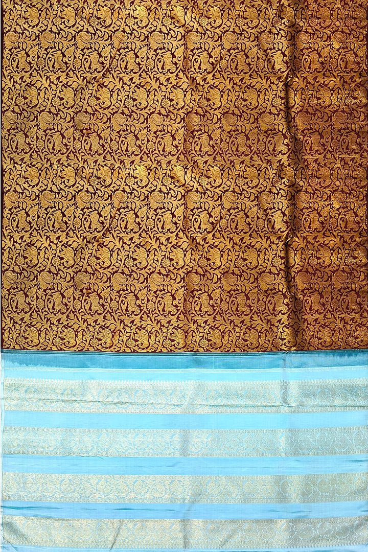 Kanchi  pure silk  brocade saree in brown with floral & animal motifs