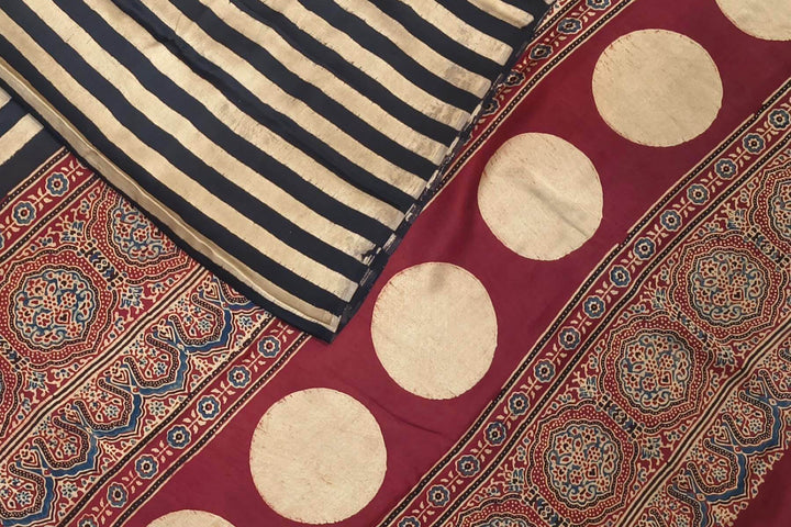Modal silk saree in cream with stripes  and hand block print ajrakh pallu
