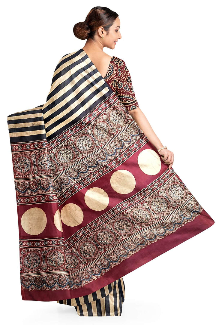 Modal silk saree in cream with stripes  and hand block print ajrakh pallu
