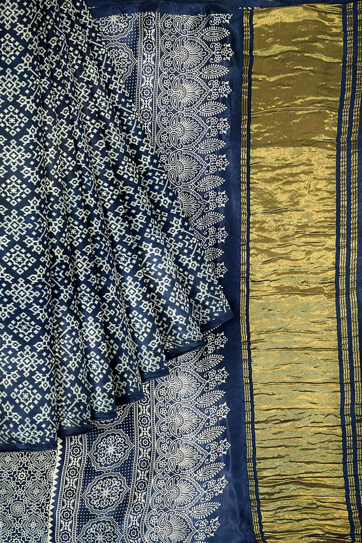 Modal silk saree in rangoli  pattern in cobalt blue with lagda patti (zari)  pallu