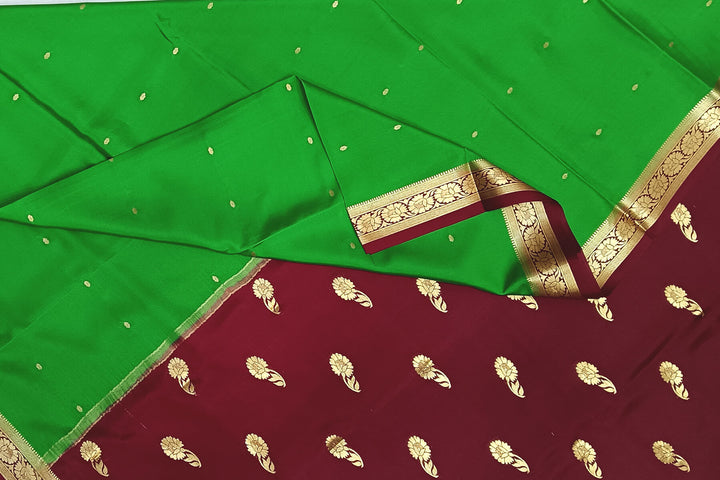 Mysore crepe pure silk saree in green with small motifs all over the body.