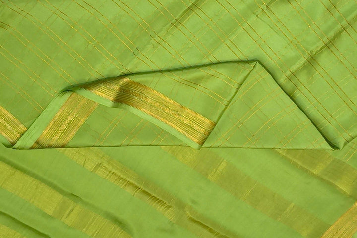 Mysore crepe pure silk saree in pista green  in fine zari checks all over the body