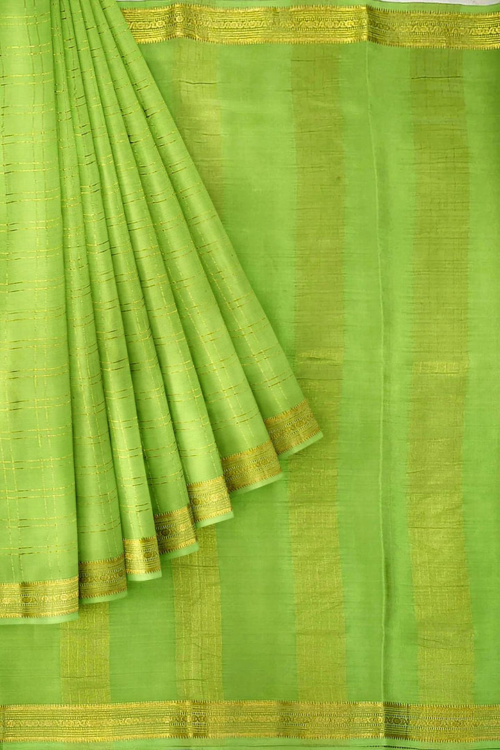 Mysore crepe pure silk saree in pista green  in fine zari checks all over the body