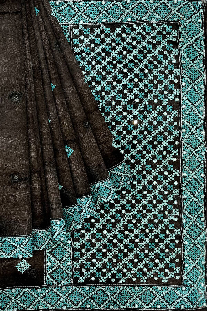 Beautiful silk organza saree in black with kutch work