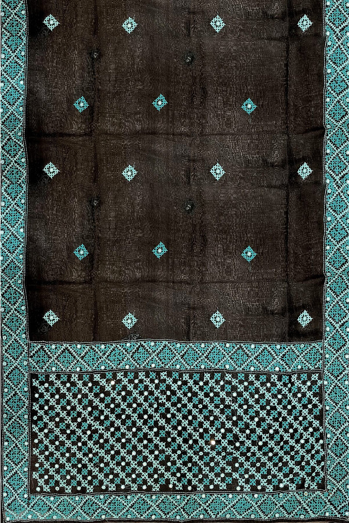 Beautiful silk organza saree in black with kutch work