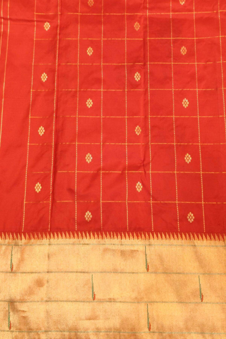 Paithani pure silk saree in grey with checks & buttis on the body .