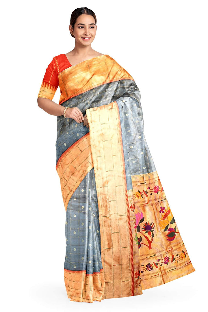 Paithani pure silk saree in grey with checks & buttis on the body .