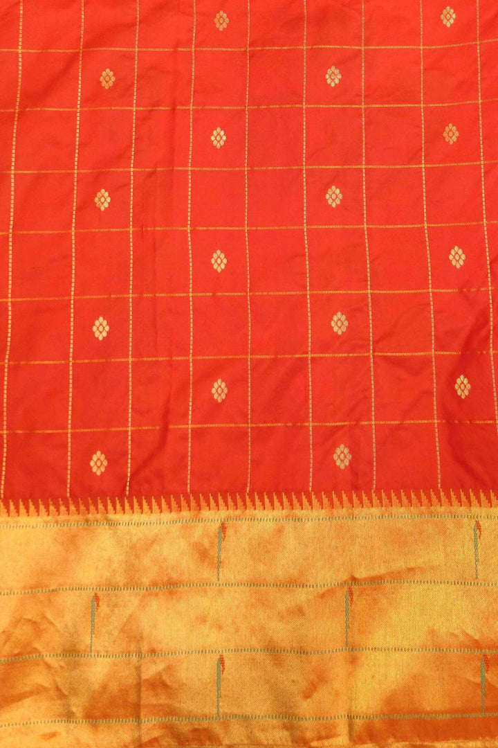 Paithani pure silk saree in black with checks & buttis on the body .