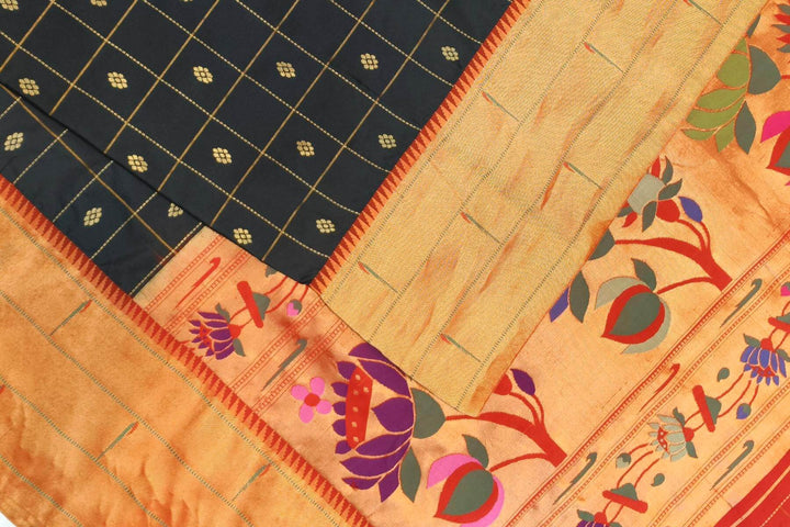 Paithani pure silk saree in black with checks & buttis on the body .