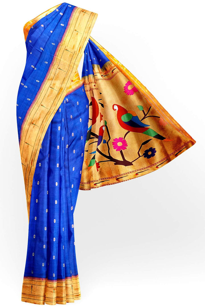 Paithani pure silk saree in royal blue with small floral motifs  on the body .