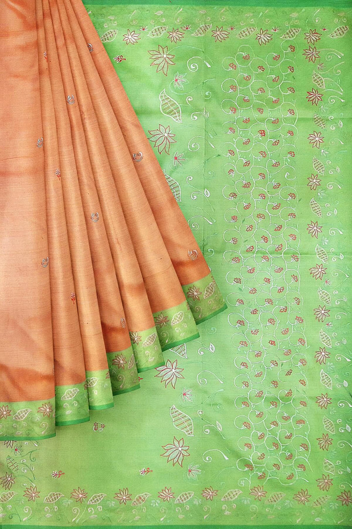 Pure silk saree in peach with embroidery work  all over the body & pallu